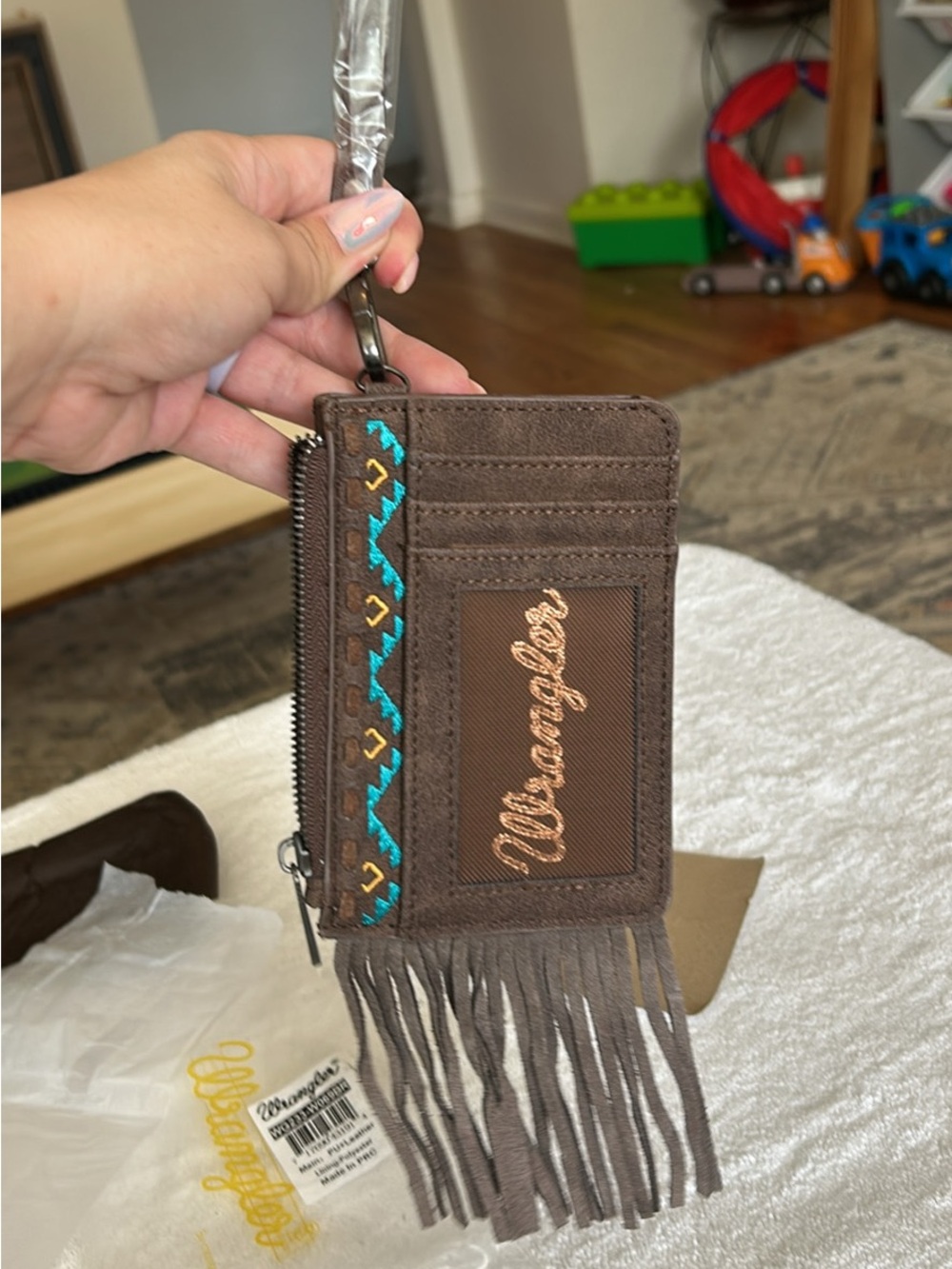 Brown Wrangler embroidered fringe wristlet wallet